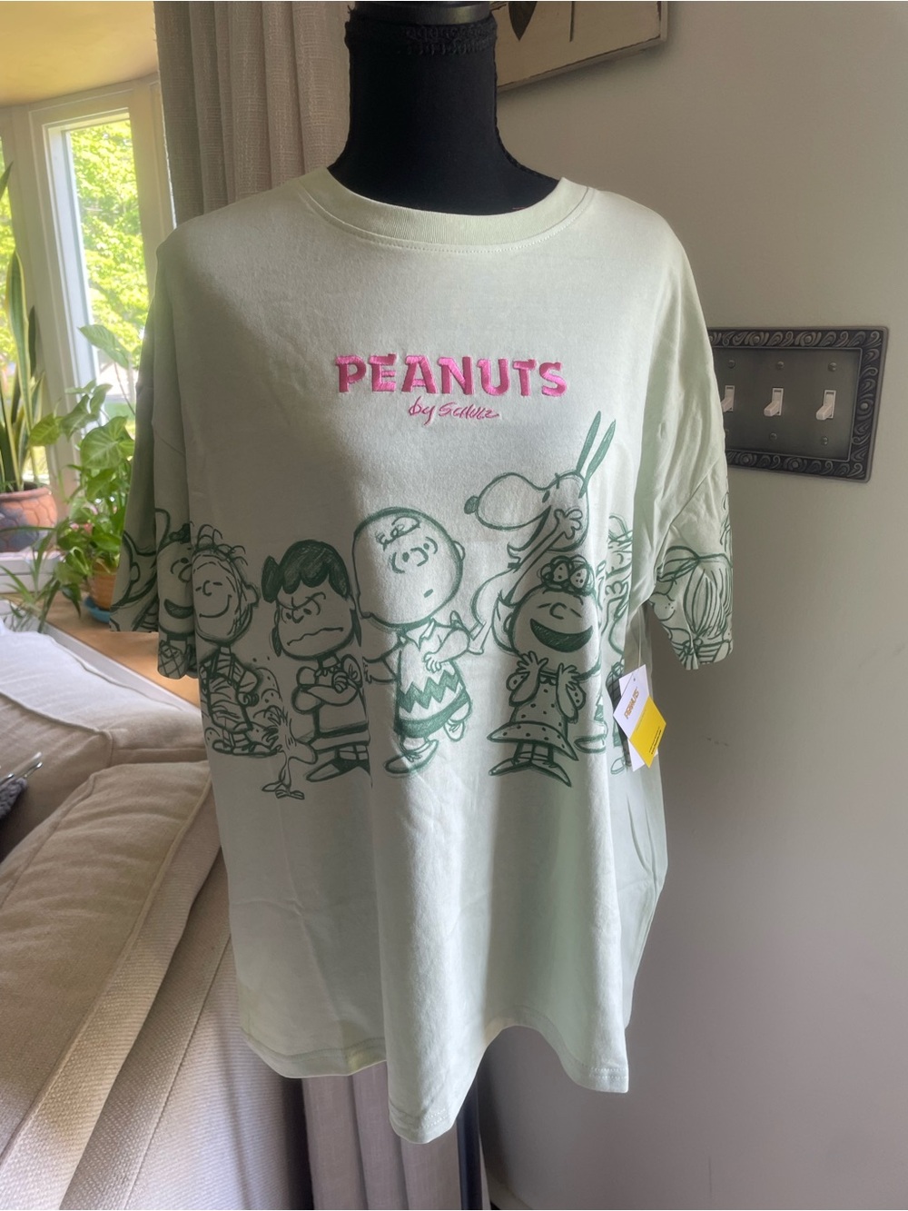 Peanuts Tee in Mint Green with Dark Green Print and Yellow Tag